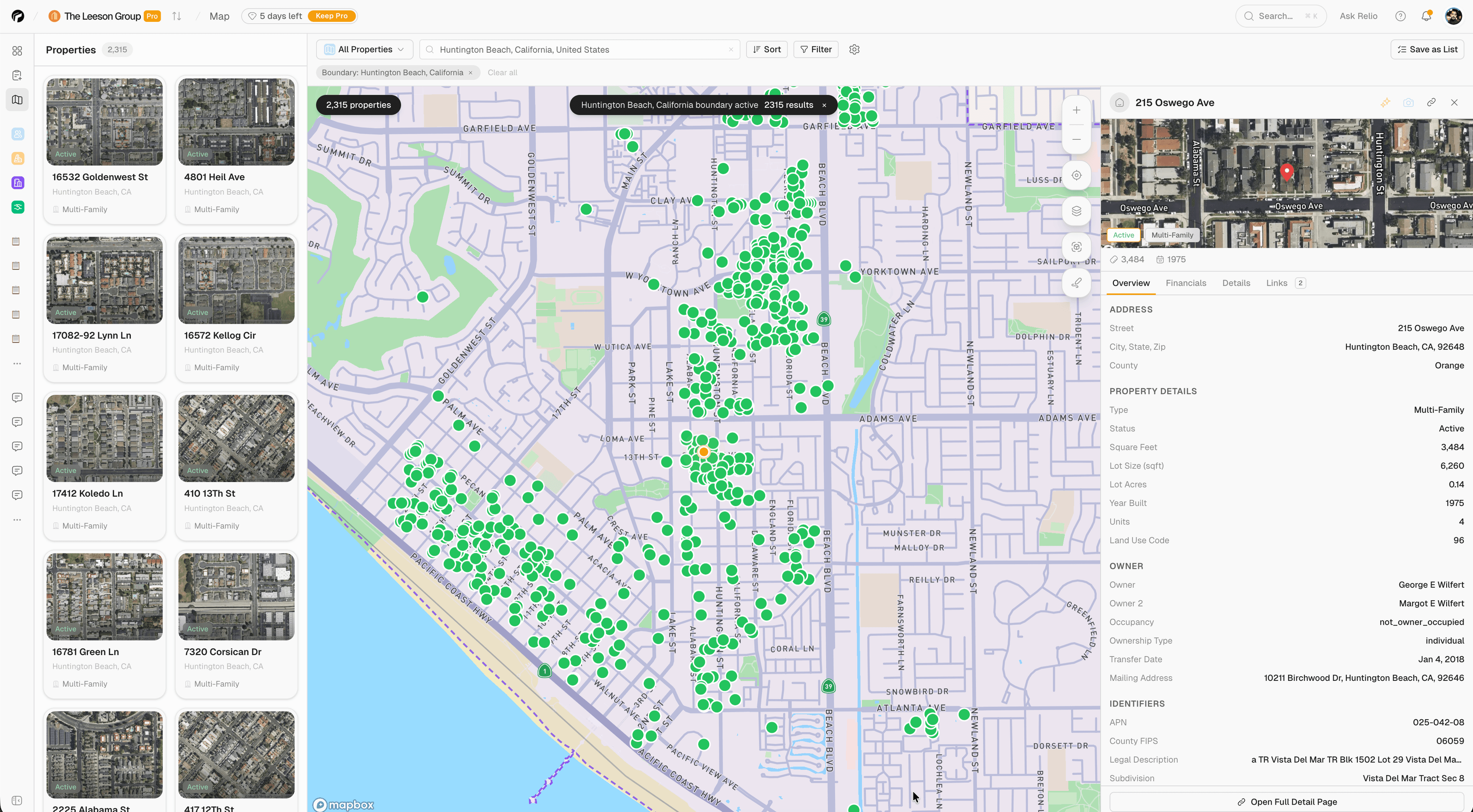 Map view with drawn territory, colored pins, and parcel boundaries